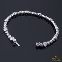 Pulsera riviere oro blanco y diamantes.