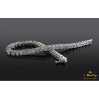 Pulsera riviere oro blanco y diamantes.