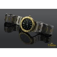 Bulgari acero y oro 30mm 