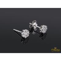 Pendientes dormilonas oro blanco y diamantes.