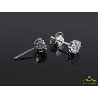 Pendientes dormilonas oro blanco y diamantes.