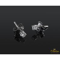 Pendientes dormilonas oro blanco y diamantes.