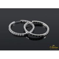 Pendientes criollas oro blanco y diamantes.