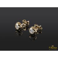 Pendientes dormilonas oro amarillo y diamantes.