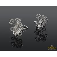 Pendientes flor oro blanco y diamantes.