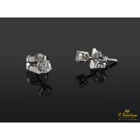 Pendientes dormilonas oro blanco y diamantes.