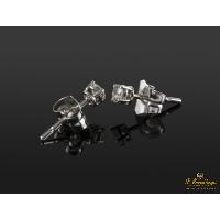 Pendientes dormilonas oro blanco y diamantes.