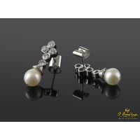 Pendientes colgantes oro blanco perla y diamantes.