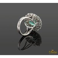 Anillo oro blanco esmeralda y orla de diamantes