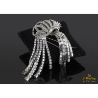 Broche-alfiler lazo oro blanco y diamantes