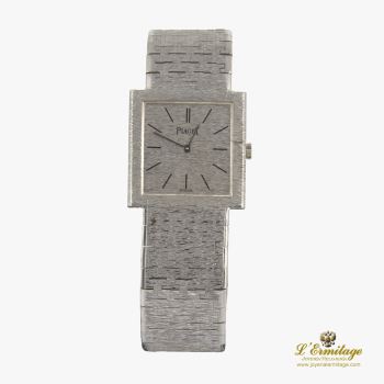 PIAGET<BR>POLO ORO BLANCO CUERDA MANUAL SEÑORA · ref.: 9131ARG