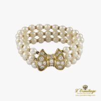 Pulsera perlas con broche de diamantes