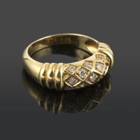 Anillo cartier oro amarillo y diamantes.