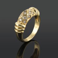 Anillo cartier oro amarillo y diamantes.