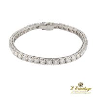 PULSERAS<BR>PULSERA RIVIERE ORO BLANCO Y DIAMANTES...