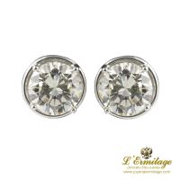 Pendientes dormilonas oro blanco color l, pureza vs y peso 5,95 cts.