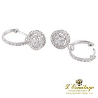 Pendientes en oro blanco y brillantes.