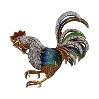 Broche en forma de gallo en oro amarillo y oro blanco con esmalte y brillantes.