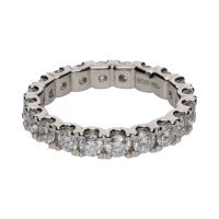 Sortija eternity en oro blanco con brillantes. Talla 14.