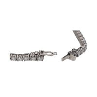 Pulsera riviere en oro blanco con brillantes.