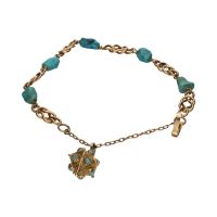 Pulsera en oro amarillo con turquesas.