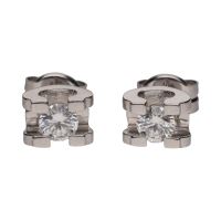 Pendientes dormilonas en oro blanco con brillantes.