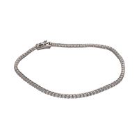 Pulsera riviere en oro blanco con brillantes.