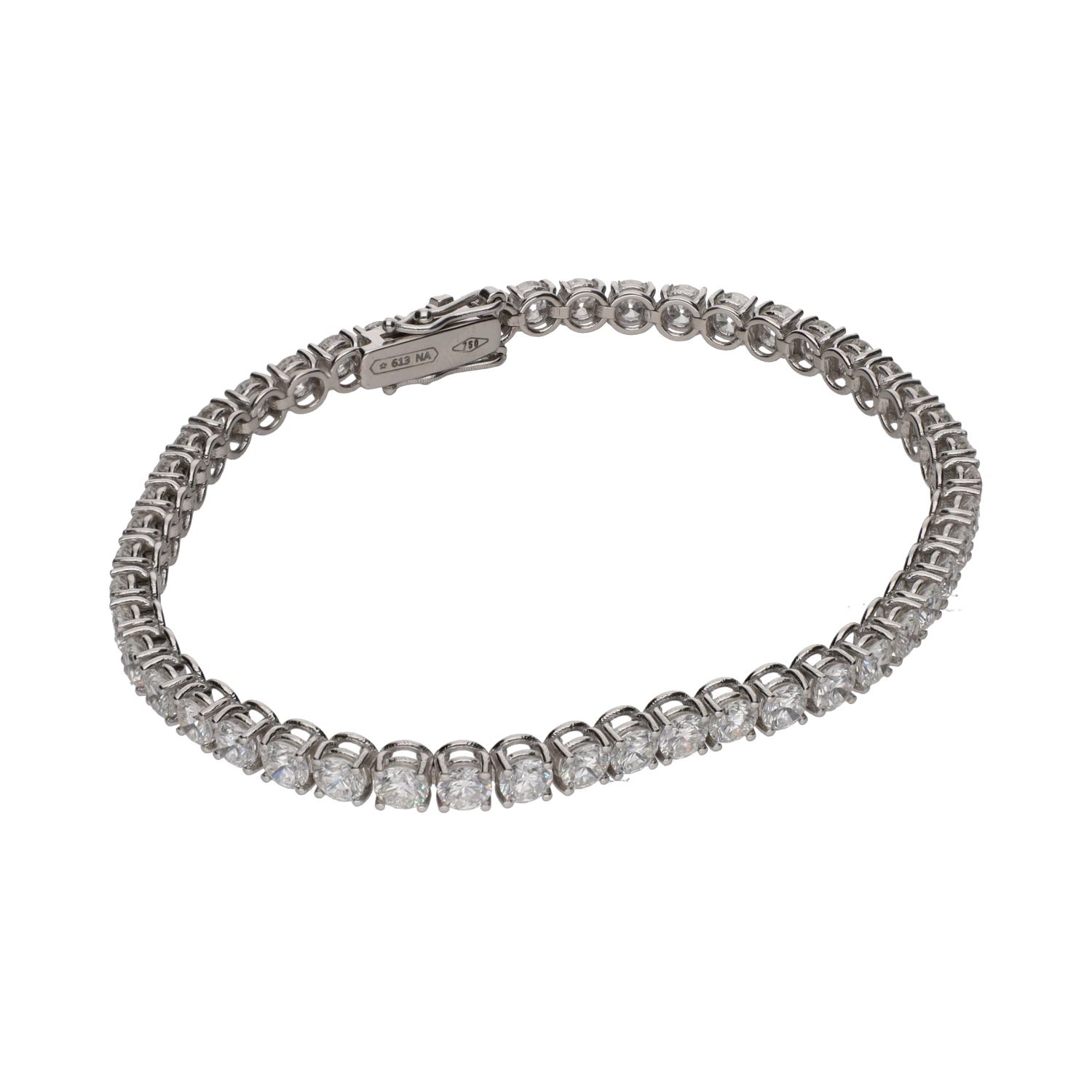 Pulsera riviere en oro blanco con brillantes.