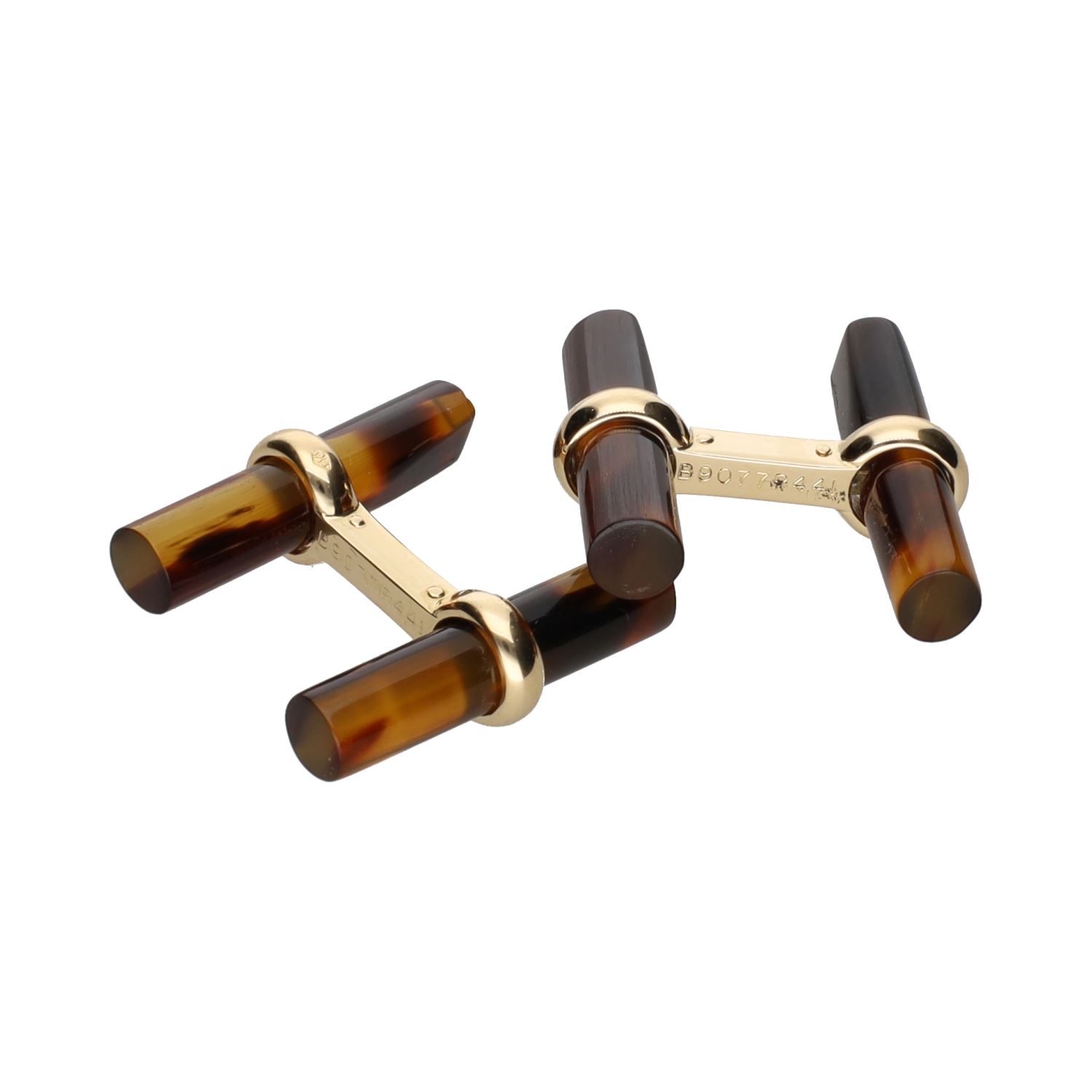 Gemelos f van cleef en oro amarillo con ojo de tigre.