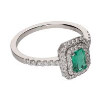 Sortija en oro blanco con esmeralda y brillantes. Talla 14.
