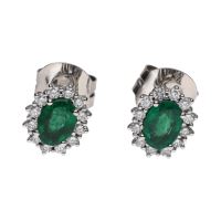 Pendientes en oro blanco con esmeraldas y brillantes.