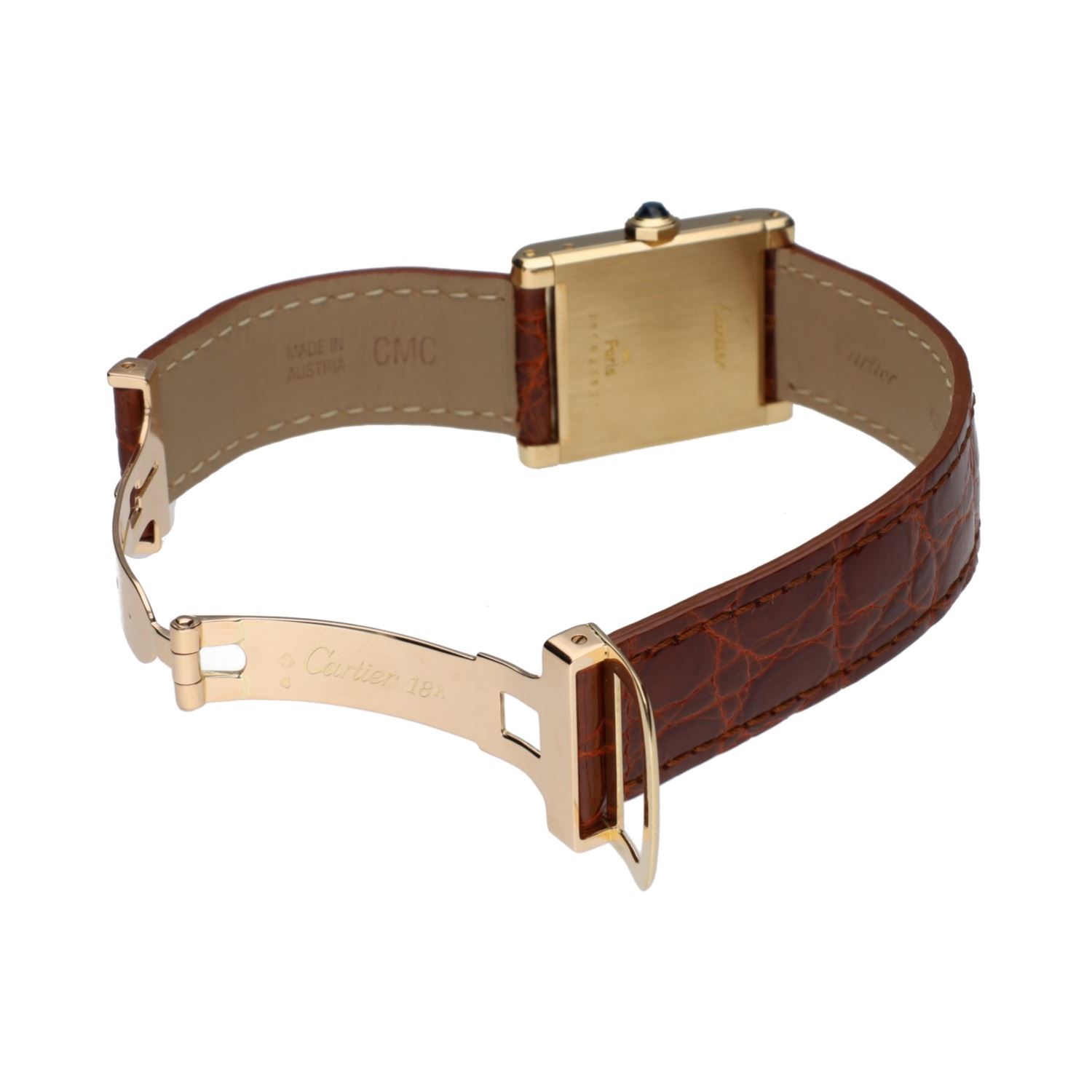 Tank en oro amarillo cuerda manual 23mm.   