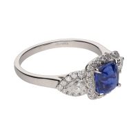 Sortija en oro blanco con zafiro y brillantes. Talla 14.
