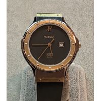 HUBLOT<BR>CLASSIC CADETE ACERO Y ORO 32MM.