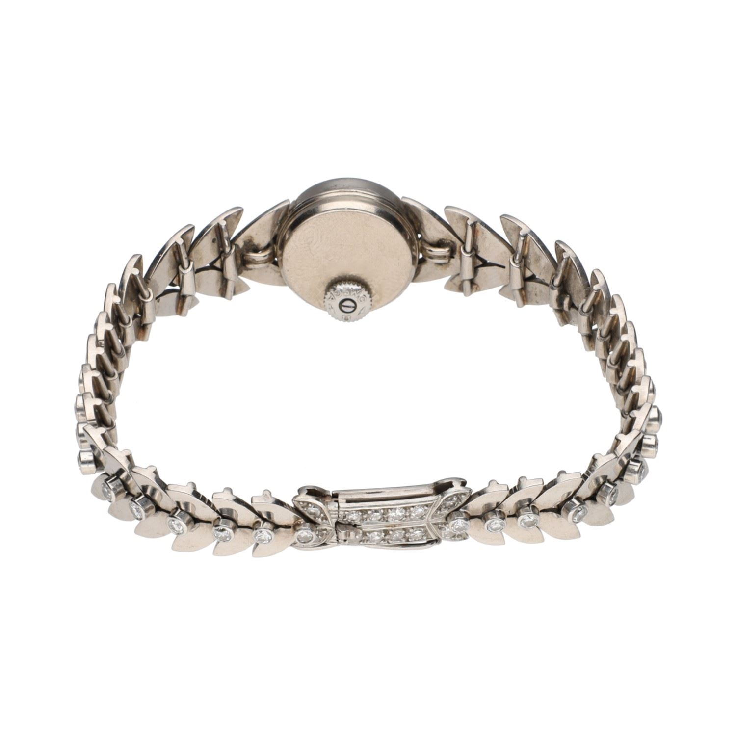 Reloj pulsera antiguo en oro blanco con brillantes.  