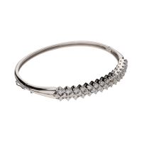 Pulsera rígida en oro blanco con brillantes.