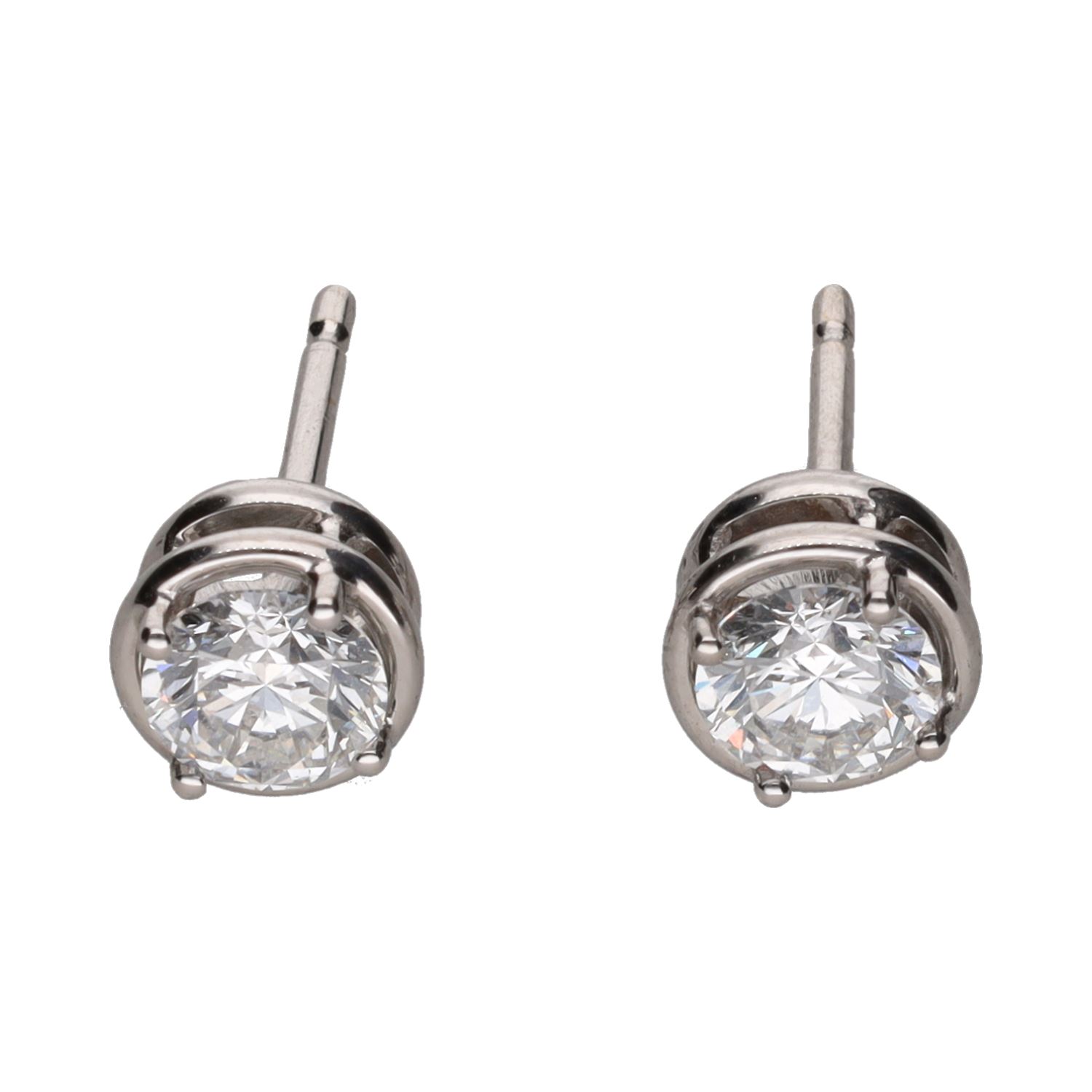 Pendientes dormilonas en oro blanco con brillantes.