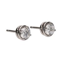 Pendientes dormilonas en oro blanco con brillantes.