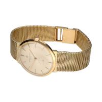 Clasico cuerda manual oro amarillo 32mm.   