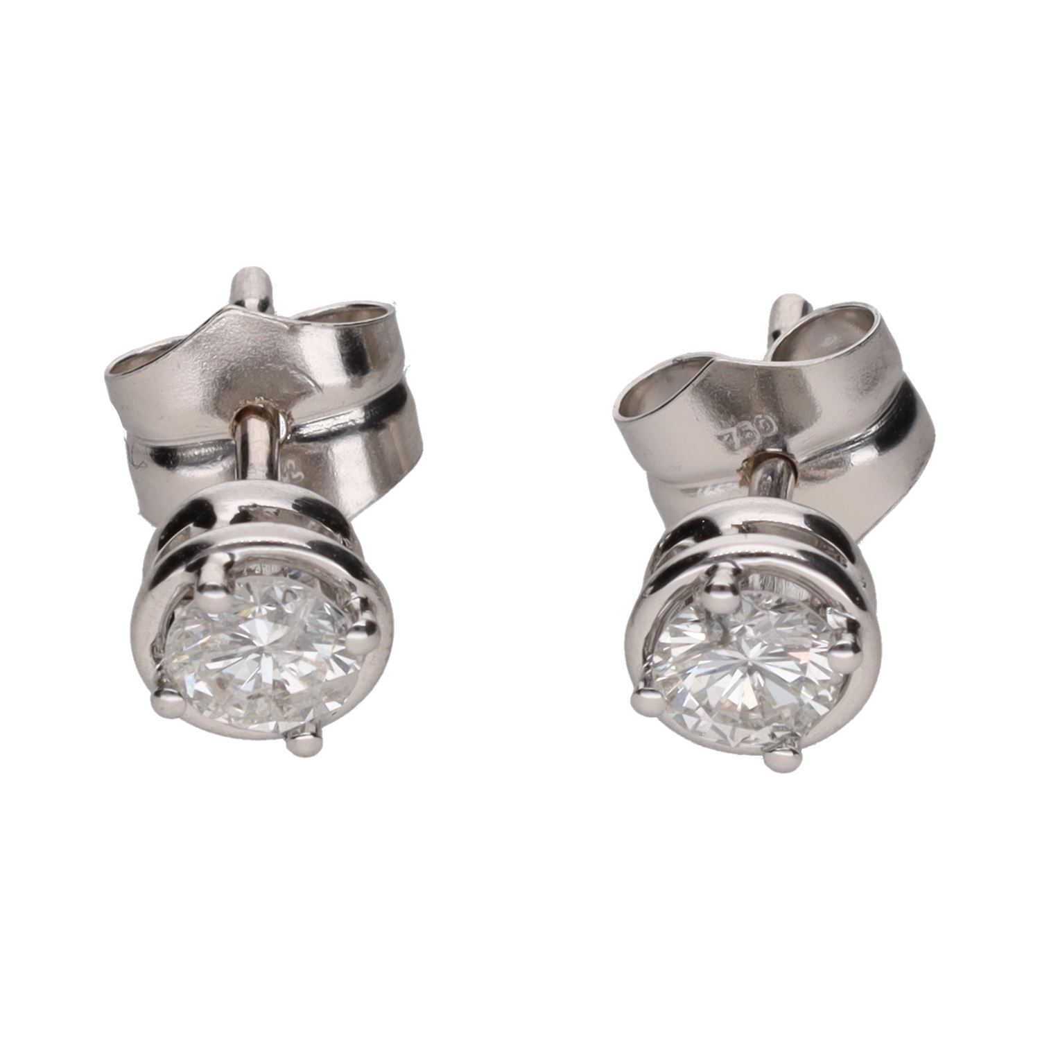 Pendientes dormilonas en oro blanco con brillantes.