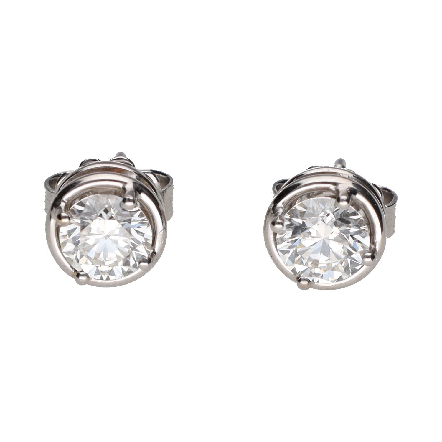 Pendientes dormilonas en oro blanco con brillantes.