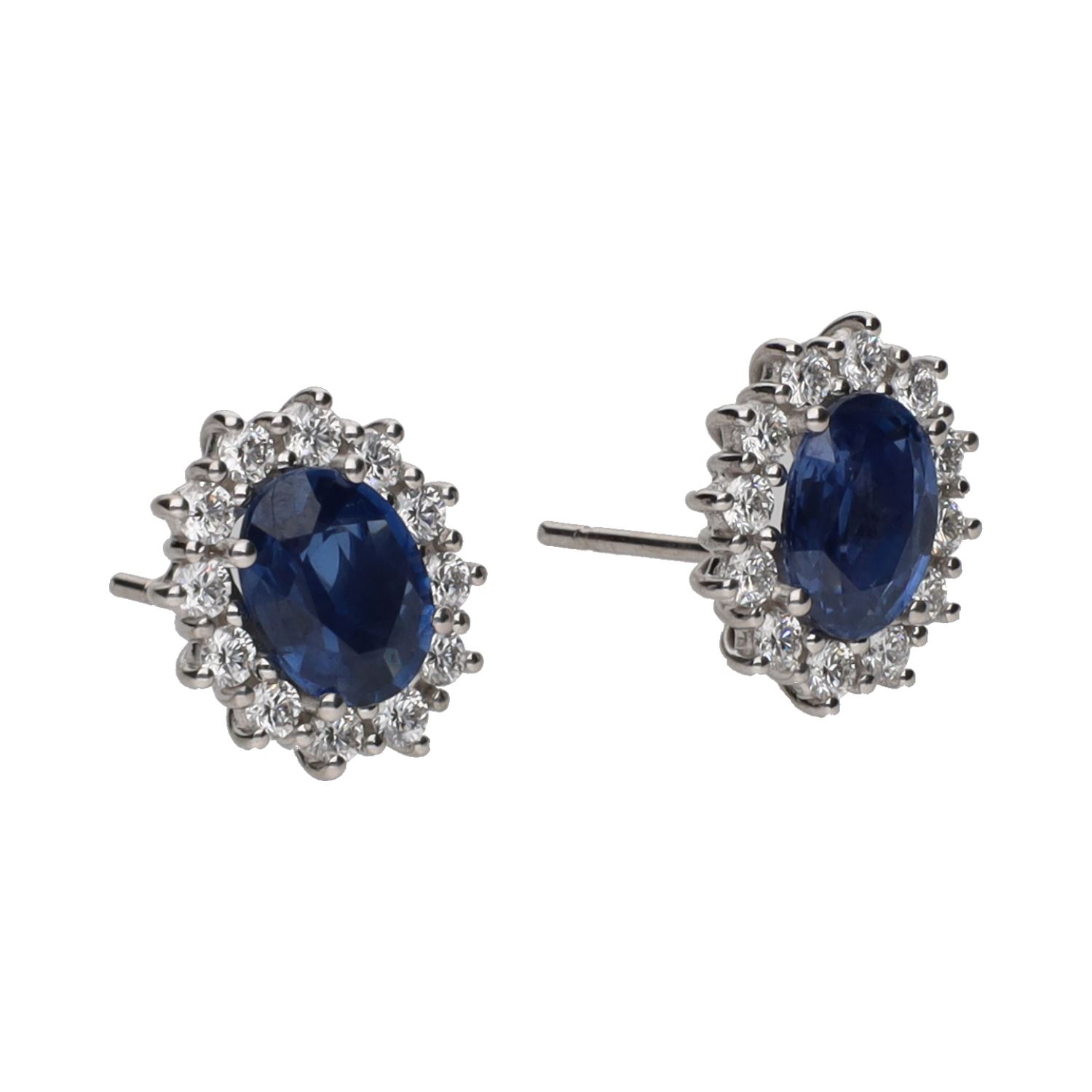 Pendientes en oro blanco con zafiros y orla de brillantes.