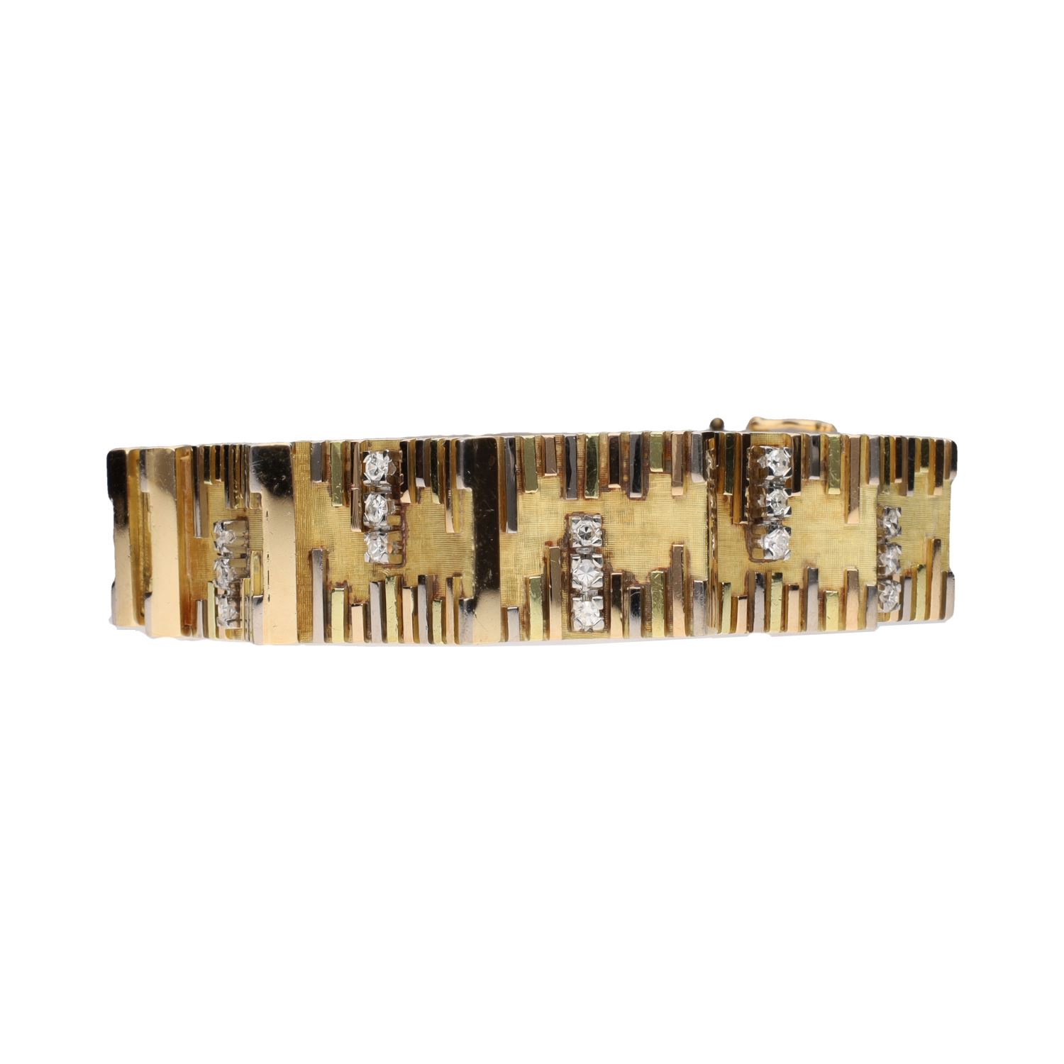 Pulsera en oro amarillo con brillantes.