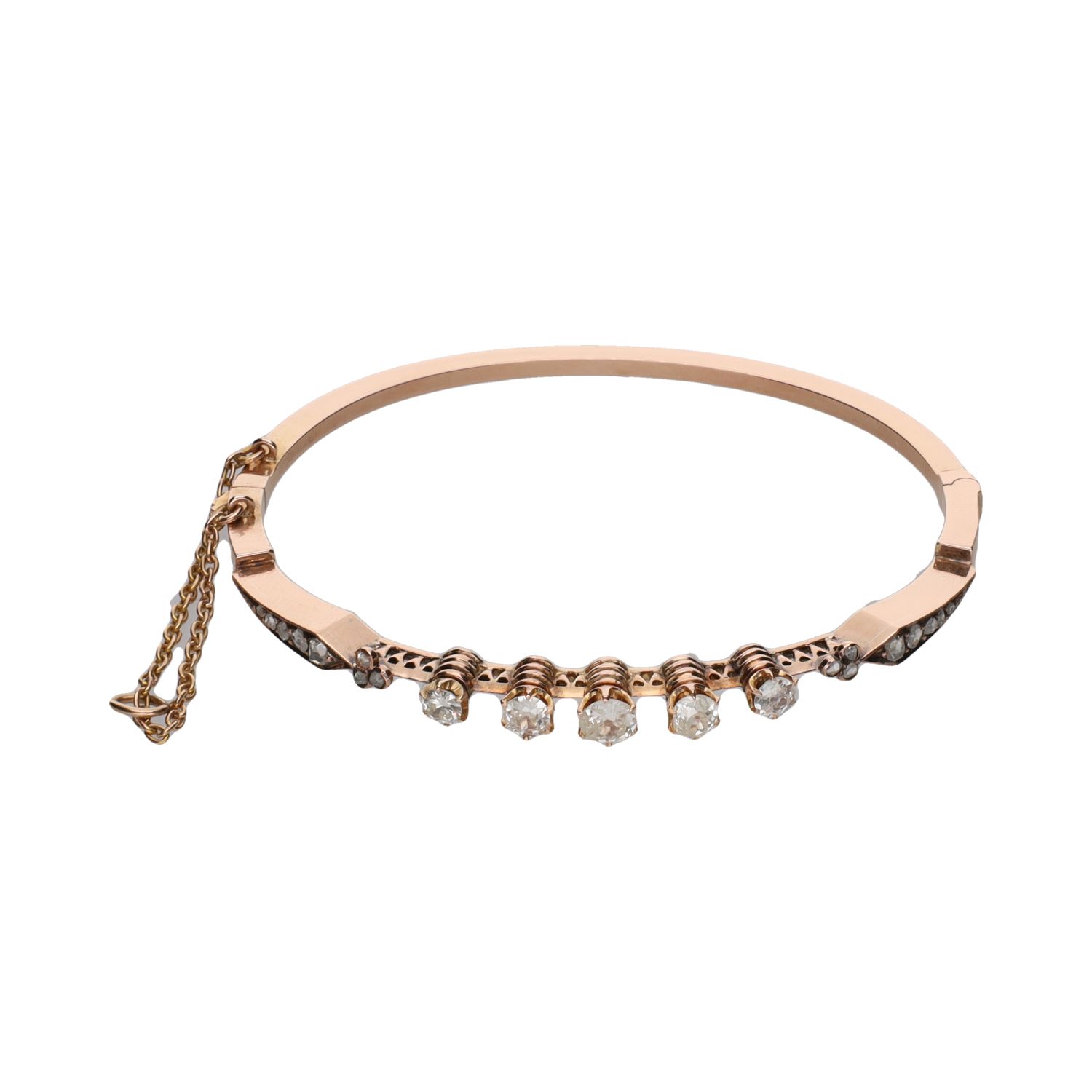 Pulsera antigua rígida en oro amarillo con diamantes.