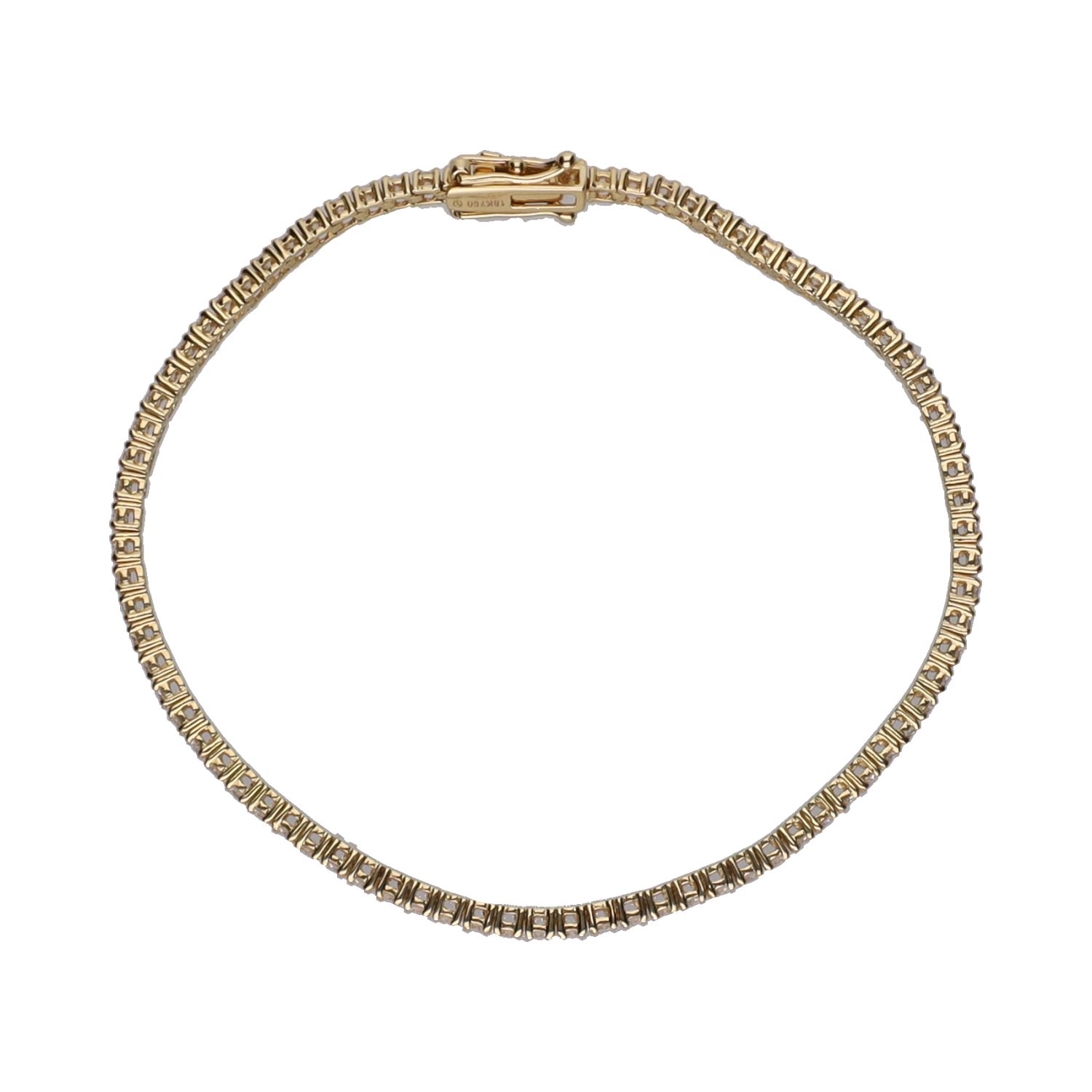 Pulsera riviere en oro amarillo con brillantes.