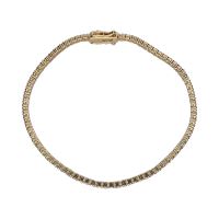 Pulsera riviere en oro amarillo con brillantes.