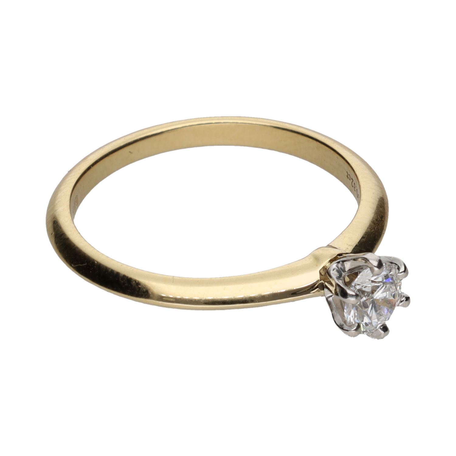 Solitario tiffany & co en oro amarillo con un brillante de 0,32ct. Talla 12.