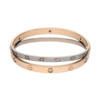 Pulsera love de cartier en oro rosa y oro blanco con brillantes. Talla 17.