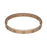 Pulsera love de cartier en oro rosa con brillantes. Talla 17