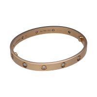 Pulsera love de cartier en oro rosa con brillantes. Talla 17